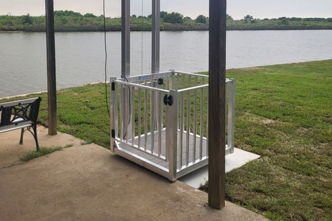 cargo lift installed on a coastal home in the lowered position