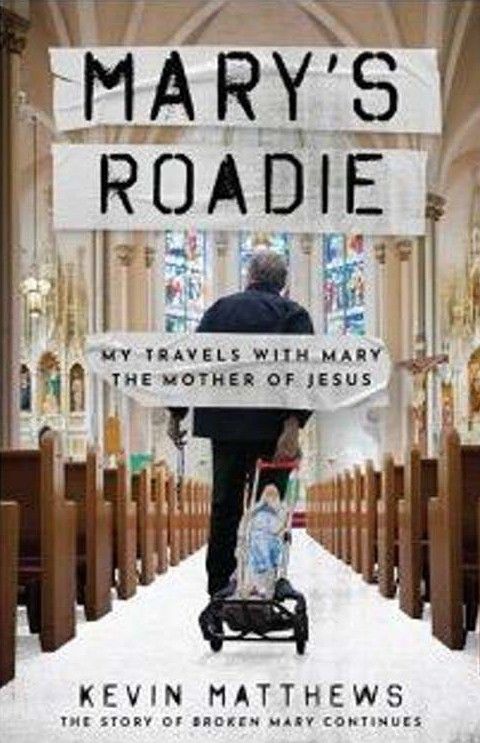 Book cover for “Mary’s Roadie” by Kevin Matthews, showing Mary pushing a stroller on a path with a city skyline behind.