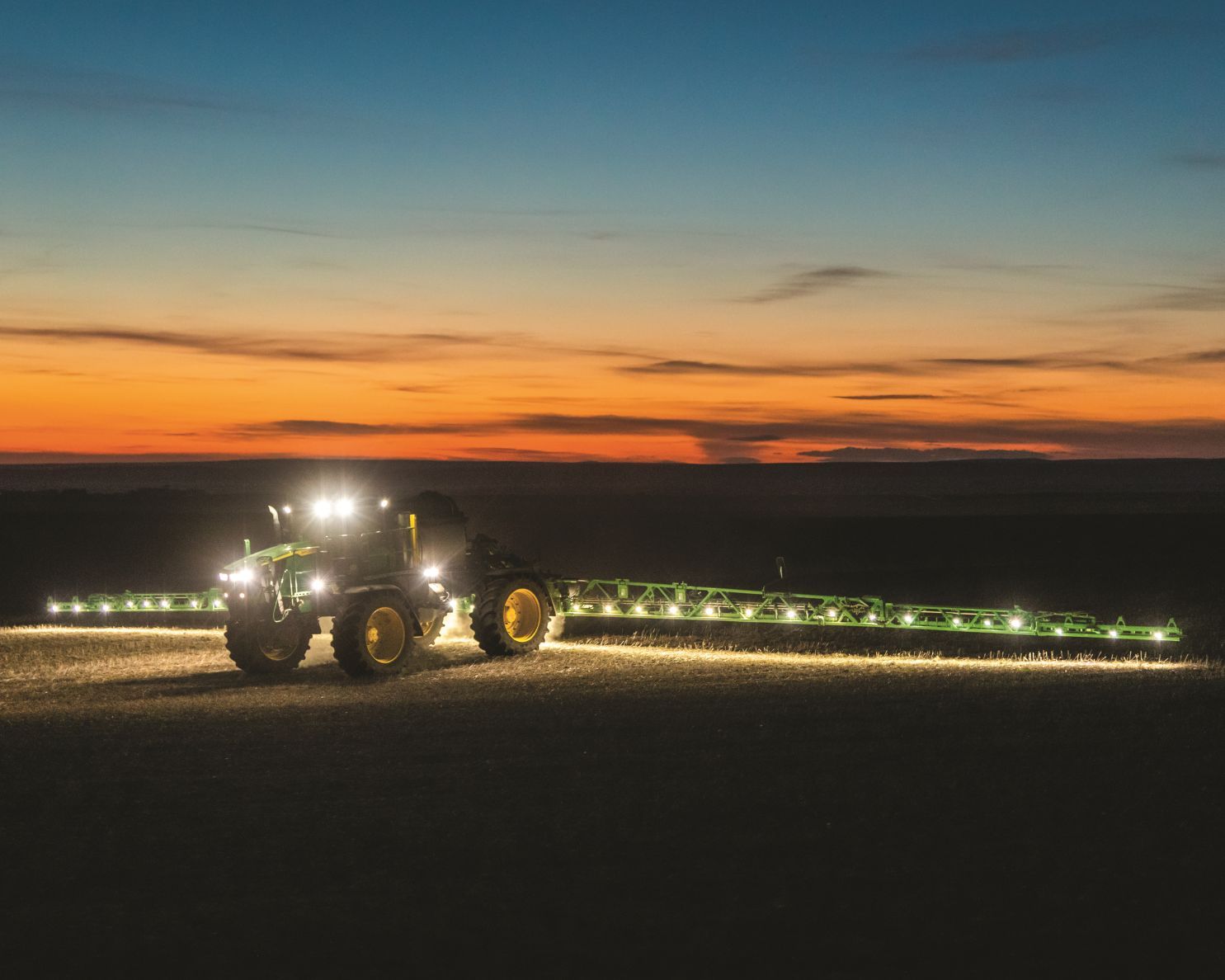 John Deere sprayer boom open with LED lights