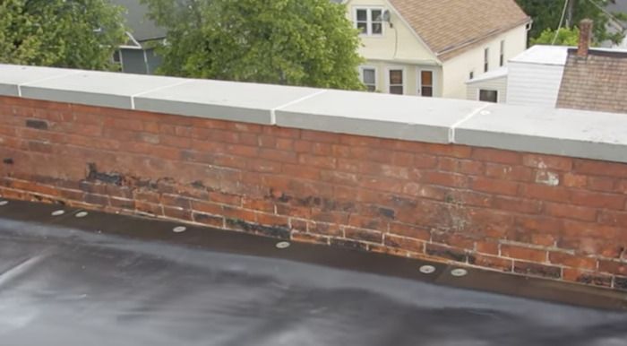 recently rebuilt parapet wall