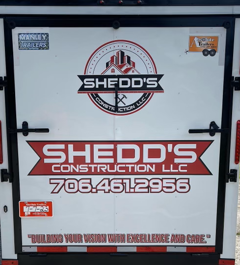 The back of a trailer for shedd 's construction llc