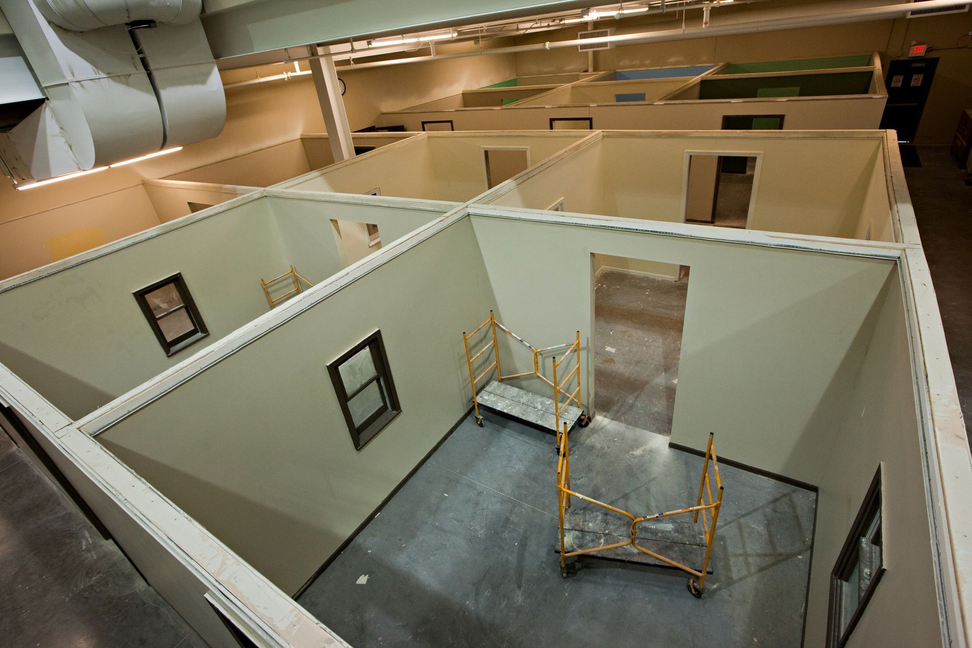 High-angle view of simulated interior rooms within the NCIFTI training facility.