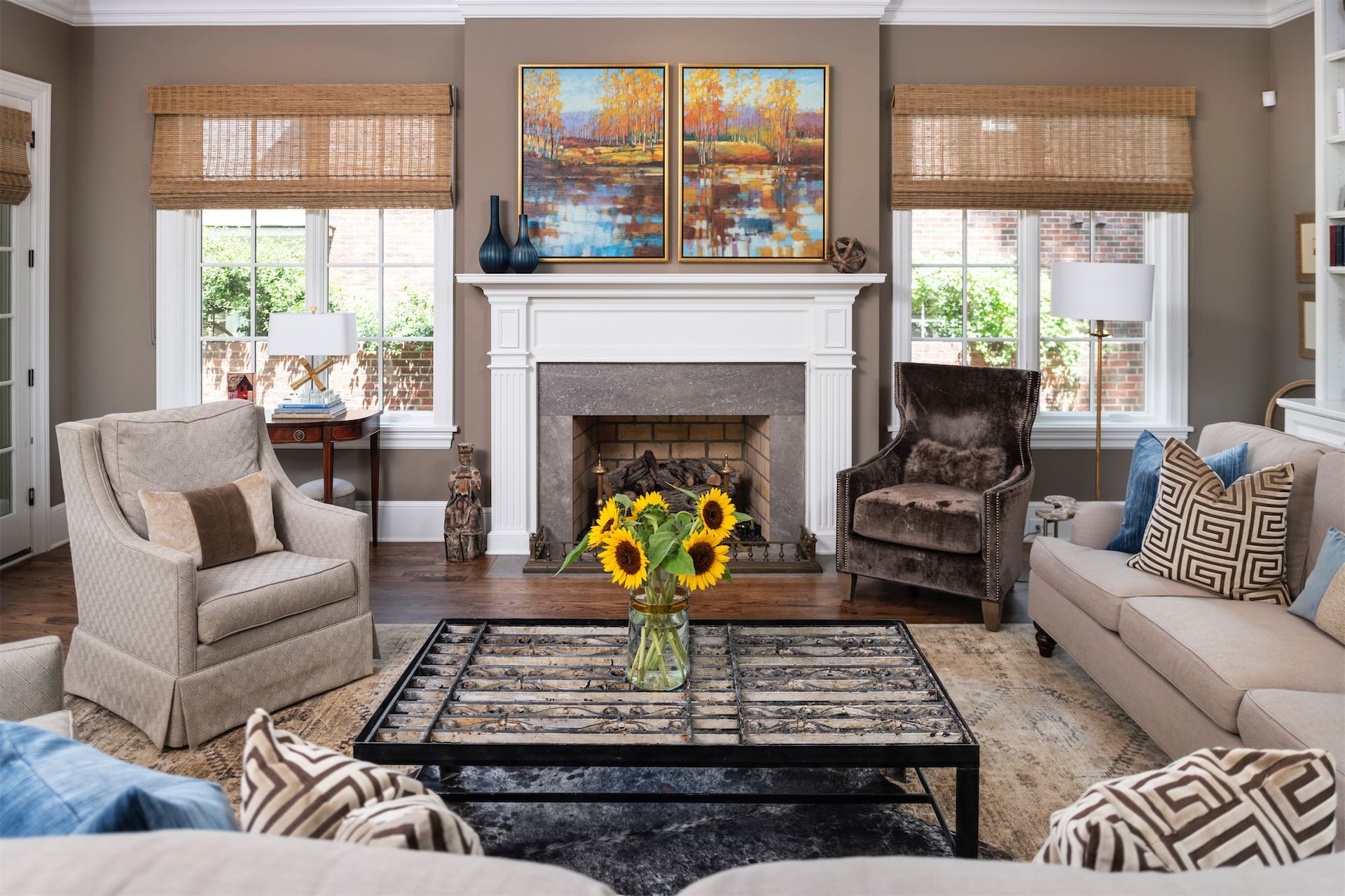 A living room filled with furniture and a fireplace.