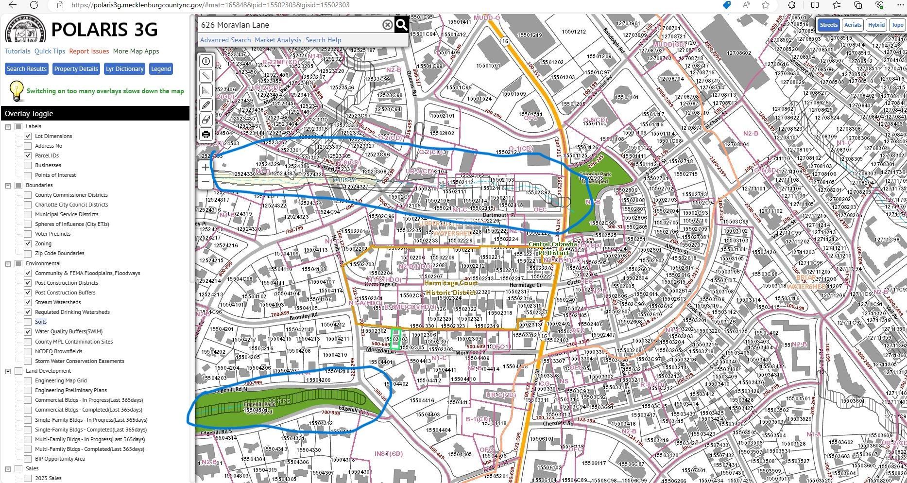 Map interface showing a city street map with marked routes and highlighted green areas.