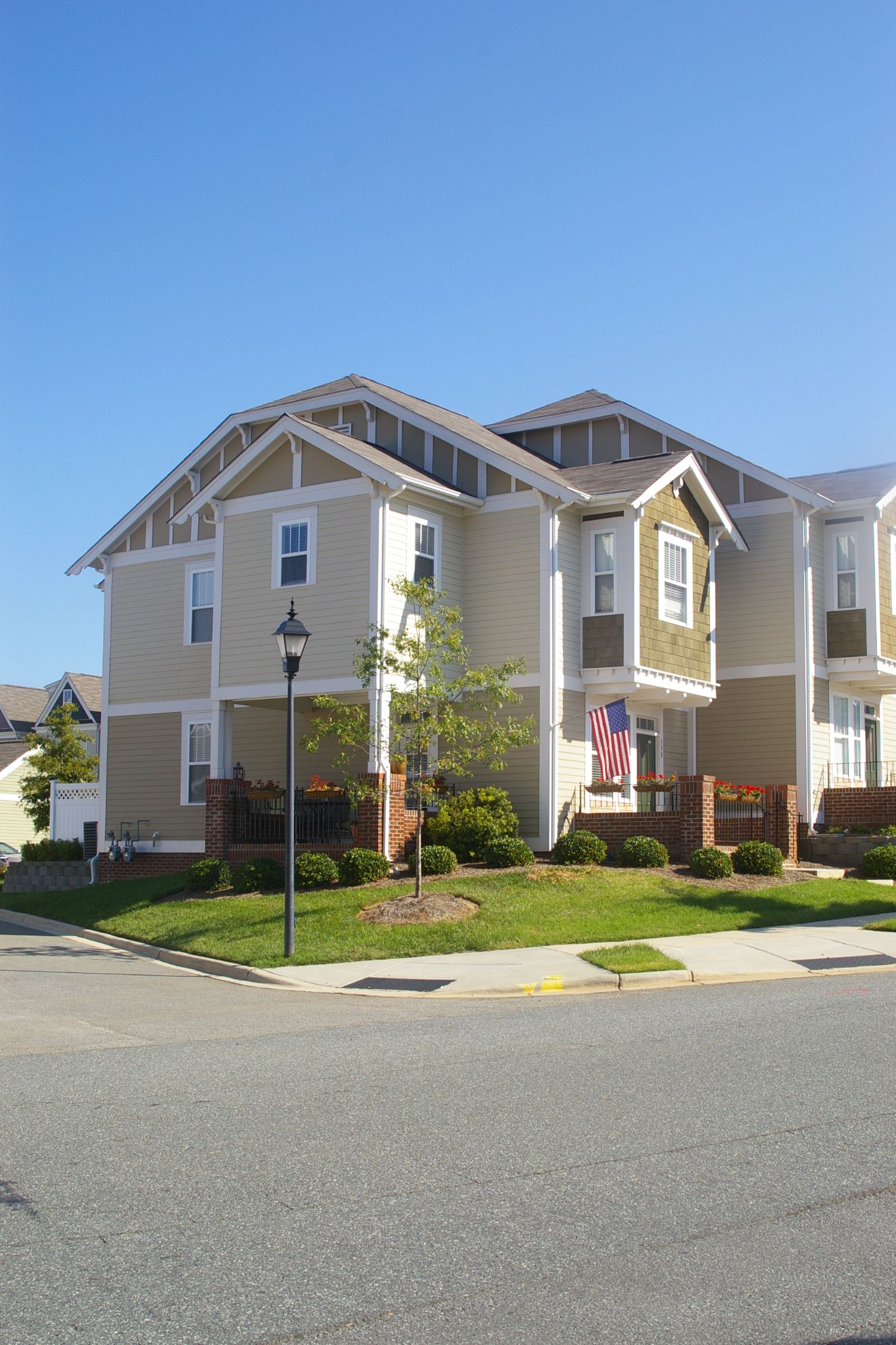 A house with an american flag in front of it