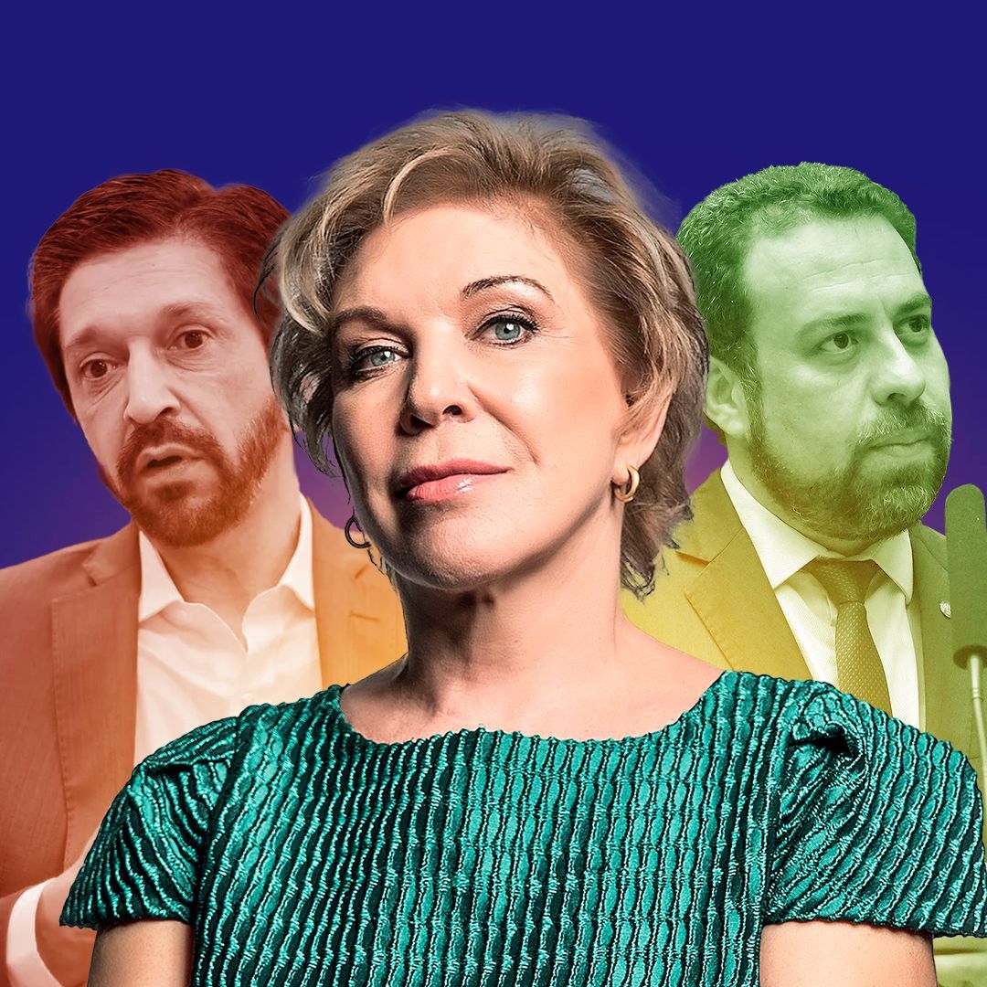 Temos 3 pessoas: Marta Suplicy com vestido verde, Boulos a direita e Ricardo Nunes a esquerda
