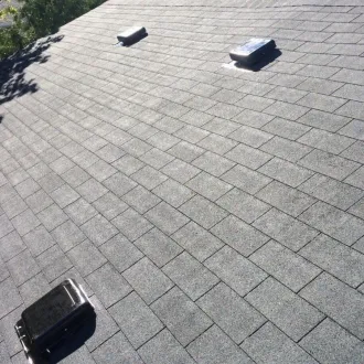 Installed roof ventilation system on new residential shingle roof