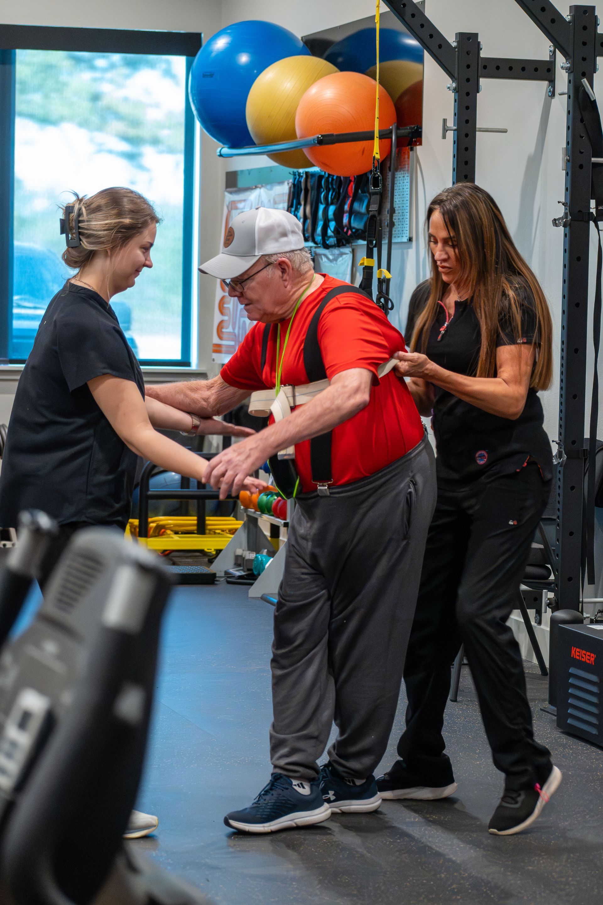 Physical therapist performing therapy on patient for therapy at MOSS Rehabilitation Center in Springtown Texas