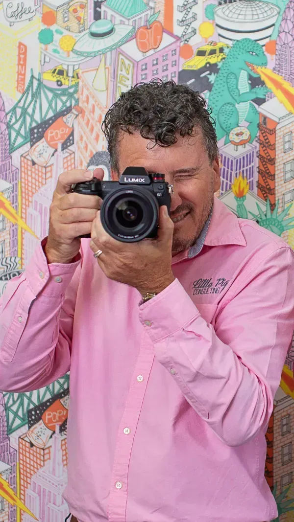 Clayton Menyweather holding a camera