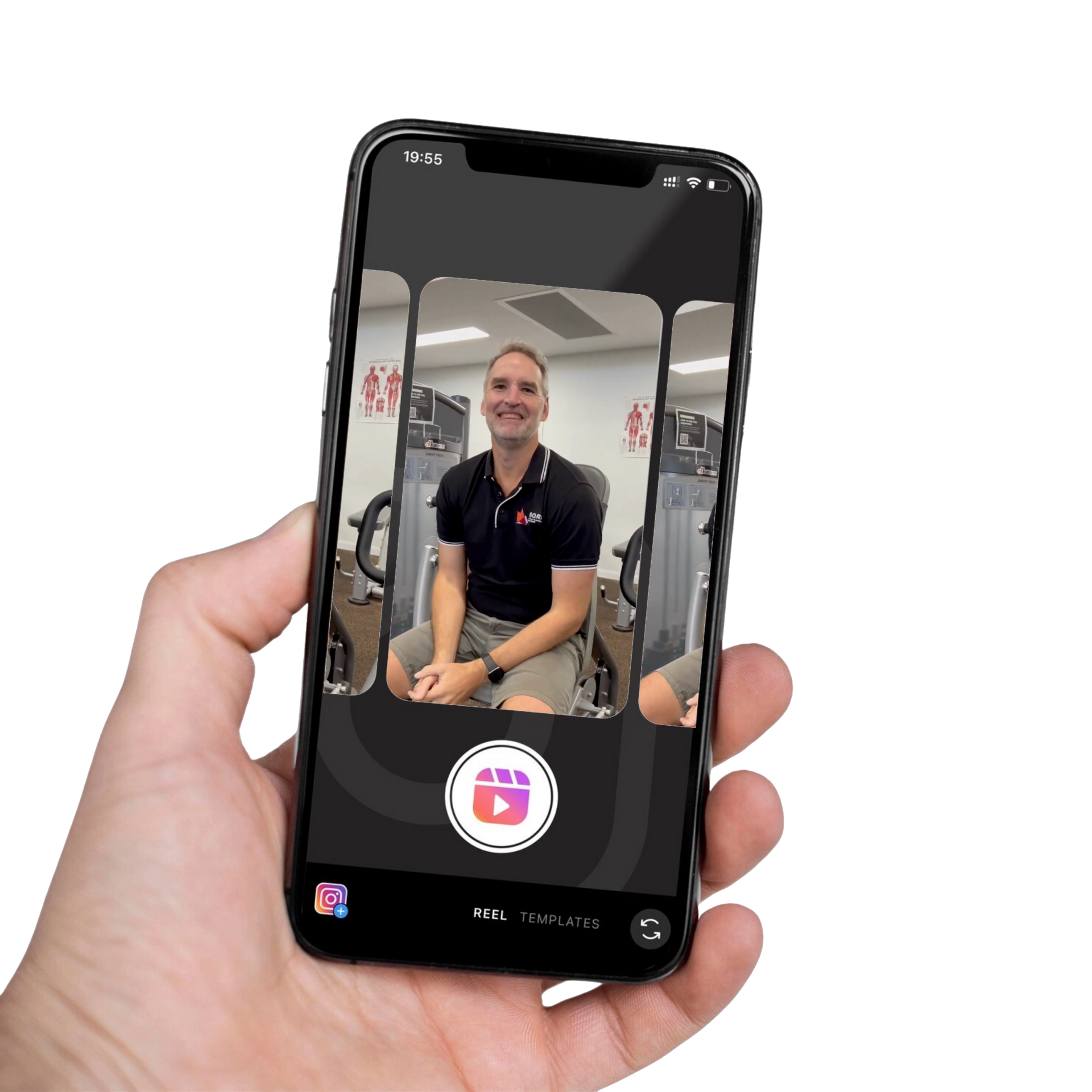 A hand holds a smartphone displaying a social media video of a smiling person in a gym setting.