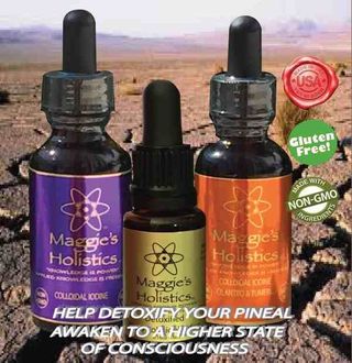 Three bottles of maggie 's holistics on a desert background