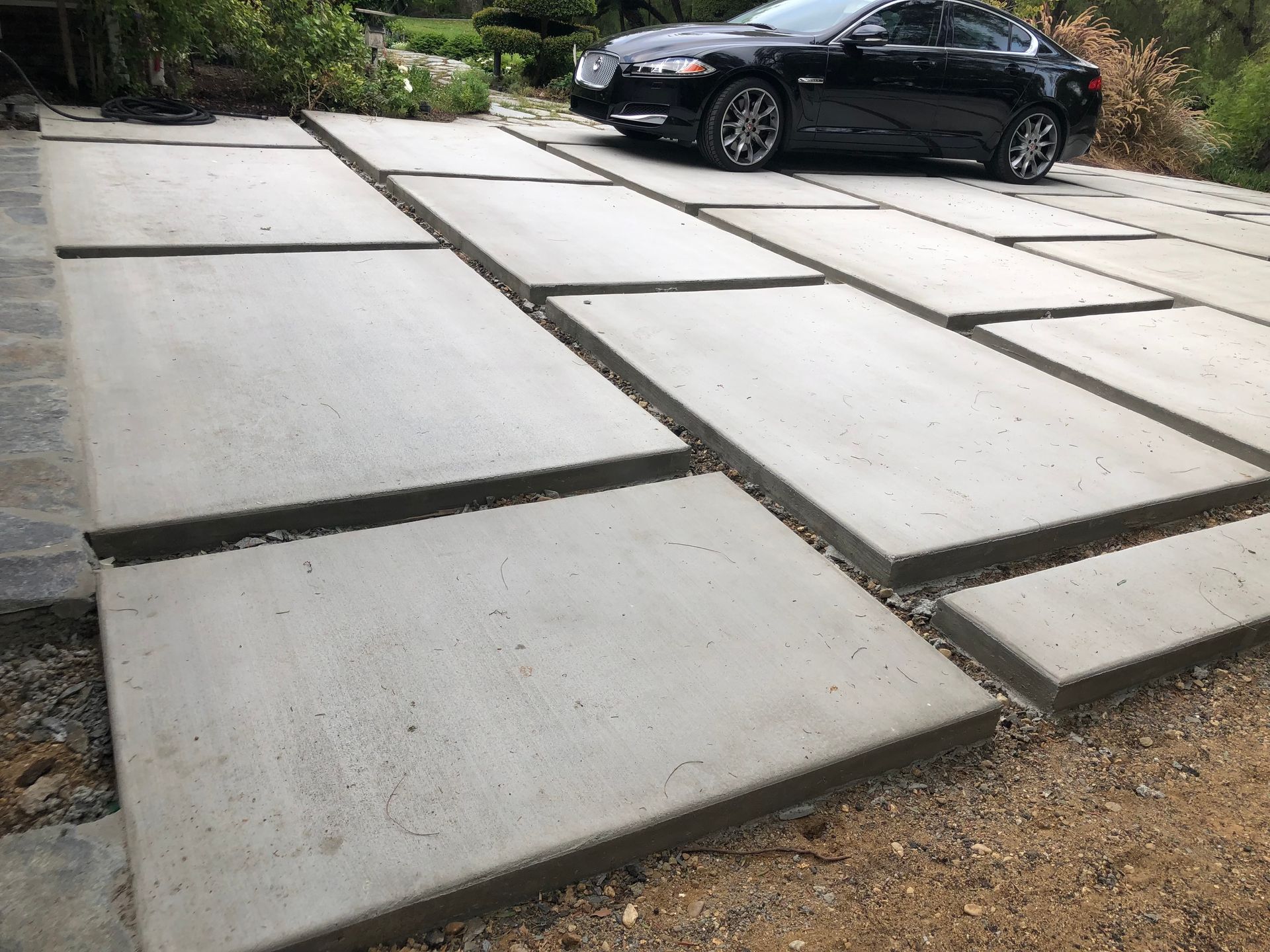 Las Palmas driveway with poured concrete pavers