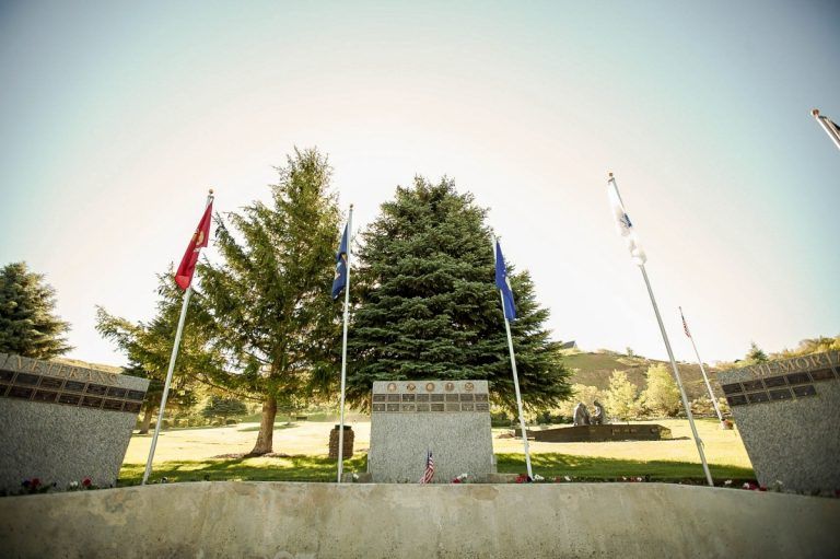 Memorial Lake View Mortuary and Cemetery with flags of different U.S. military branches