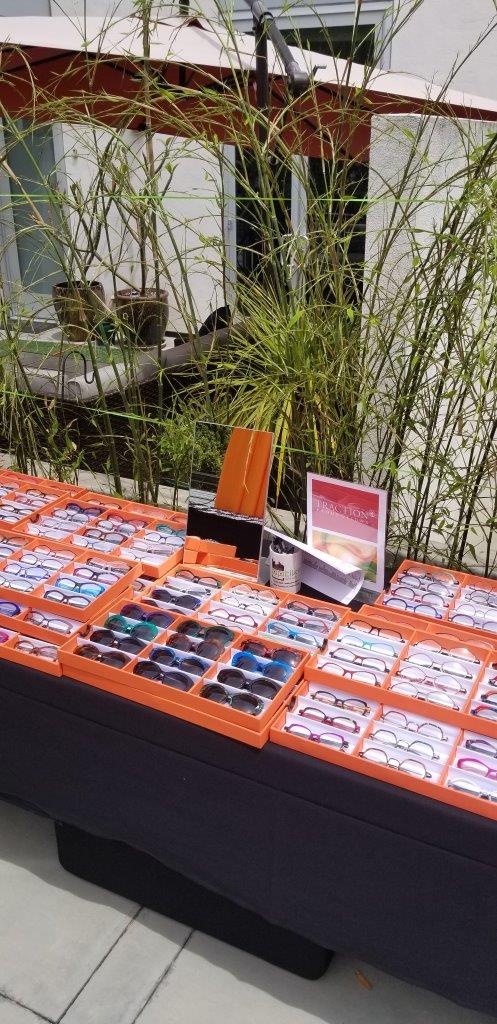 More orange display boxes of colorful frames at Raise Your Glasses 2019 Event