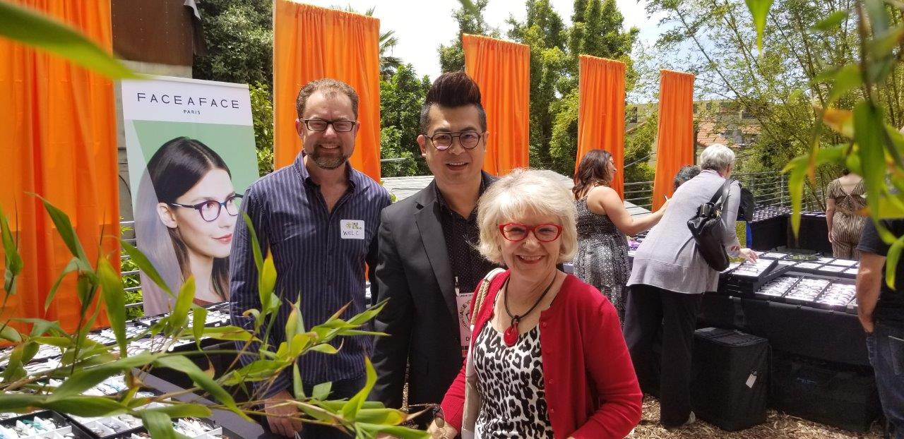 4 People standing outside posing at frames at Raise Your Glasses 2019 Event