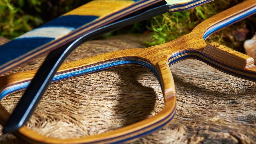 Close up of a blue and yellow FEB31ST wood frame
