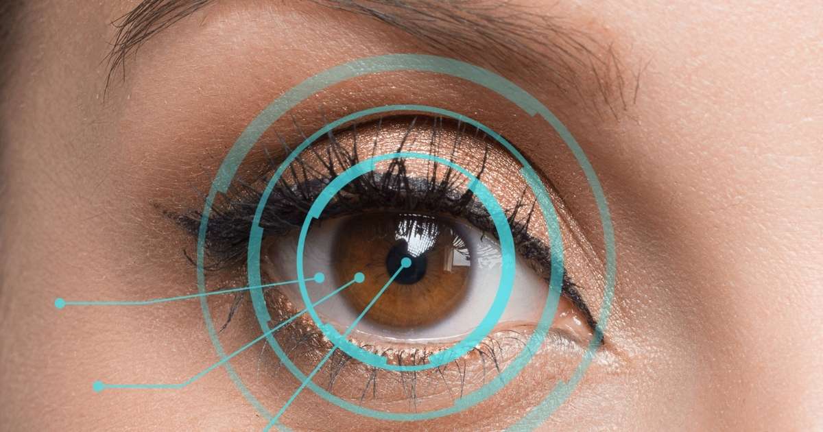 Brown eye covered by light blue concentric circles and focus points
