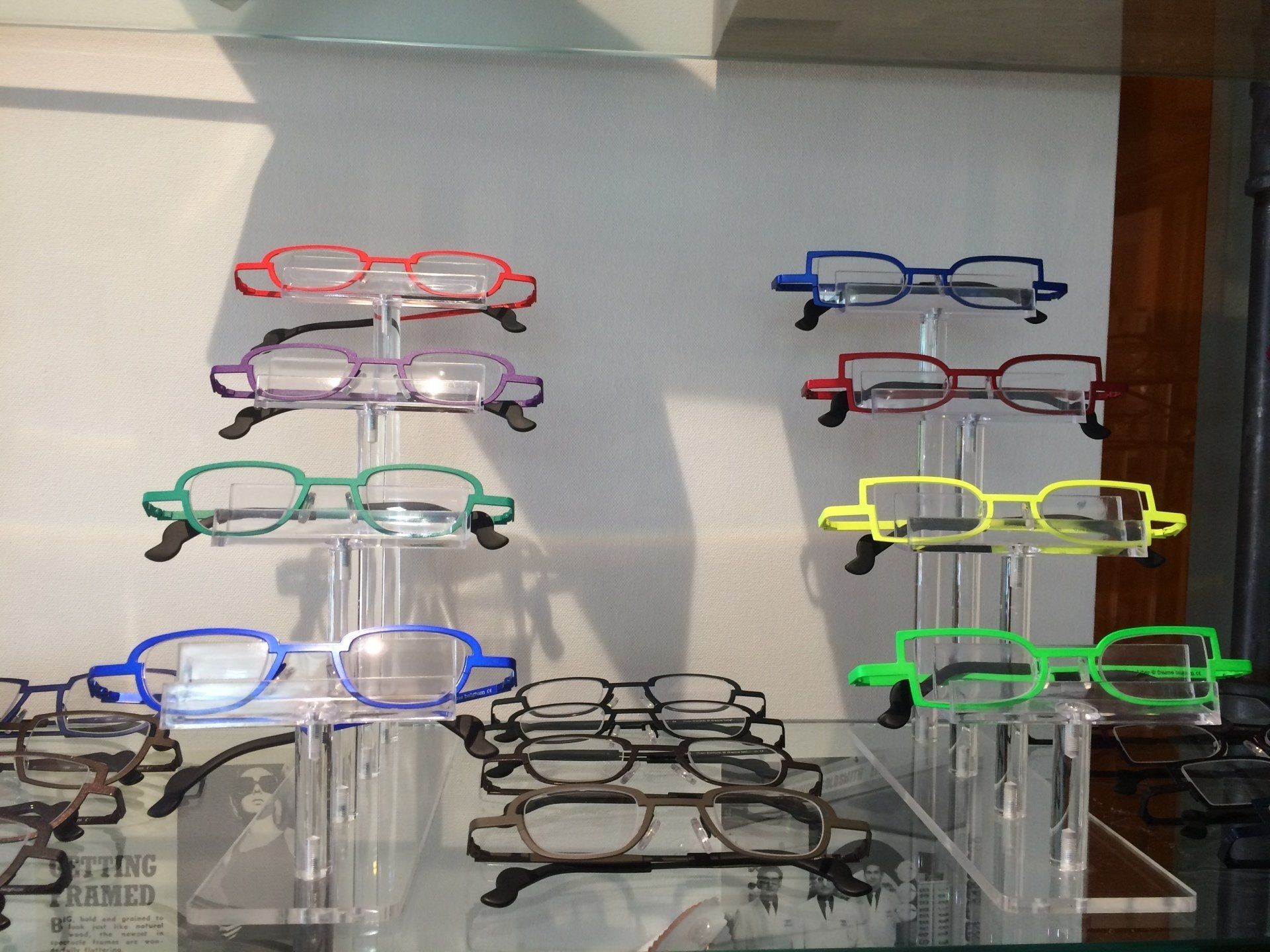 Standing display of frames at Theo Trunk Show event at Urban Optiks