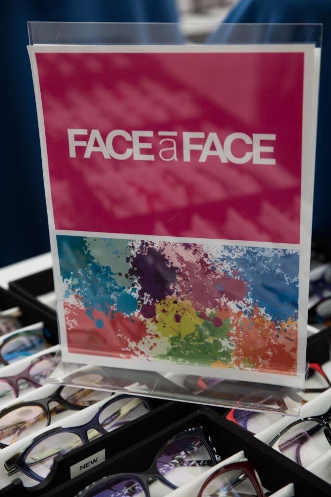 Face a Face sign and tabletop display at 2018 Raise Your Glasses