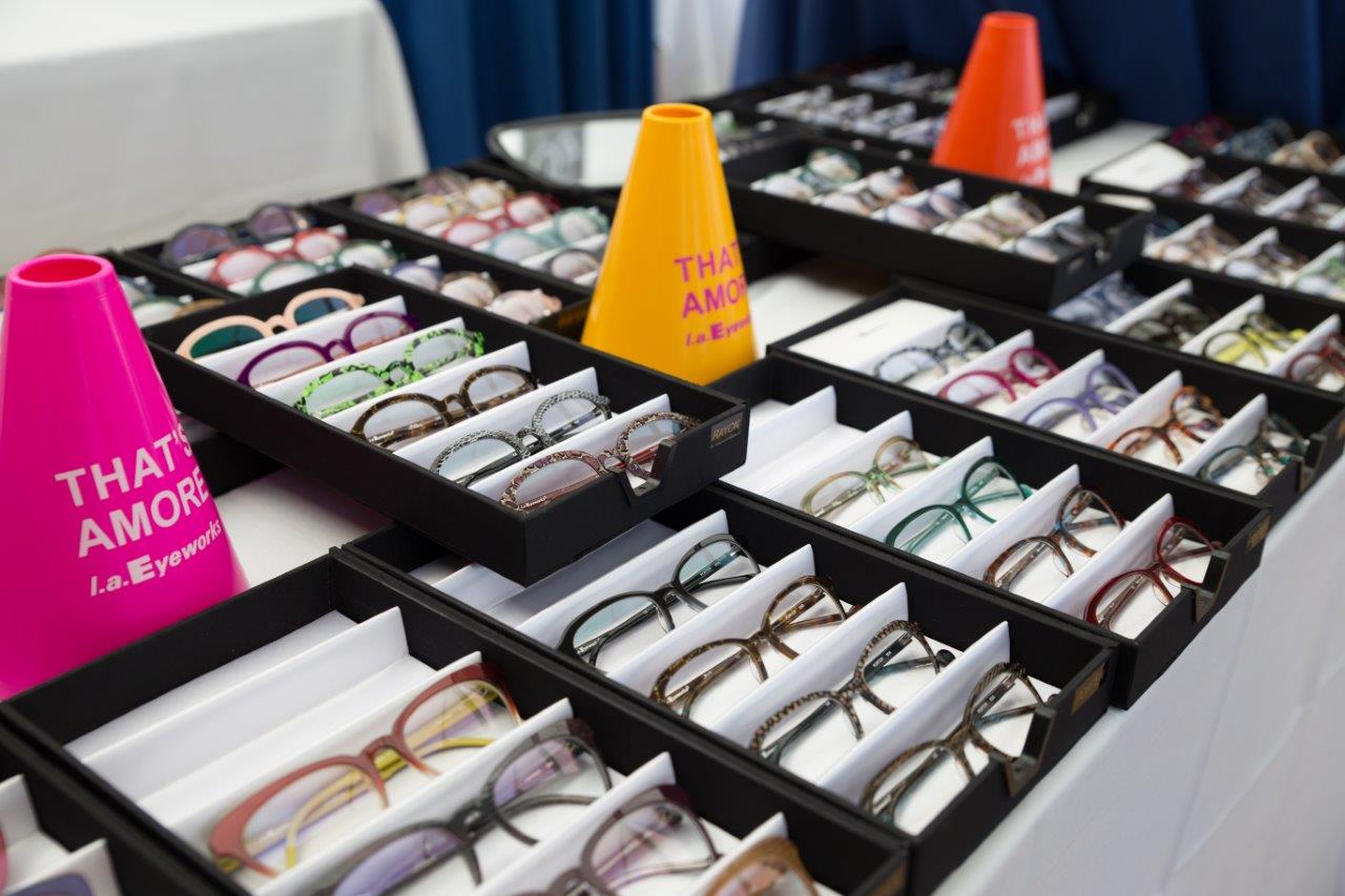 Display boxes with eyeglass frames at 2018 Raise Your Glasses
