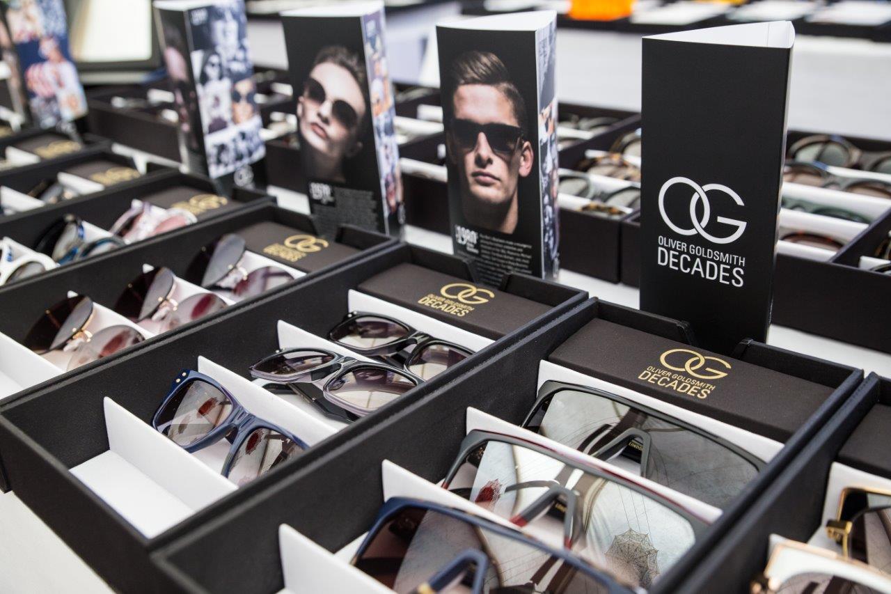 Tabletop display of Oliver Goldsmith eyewear at 2018 Raise Your Glasses