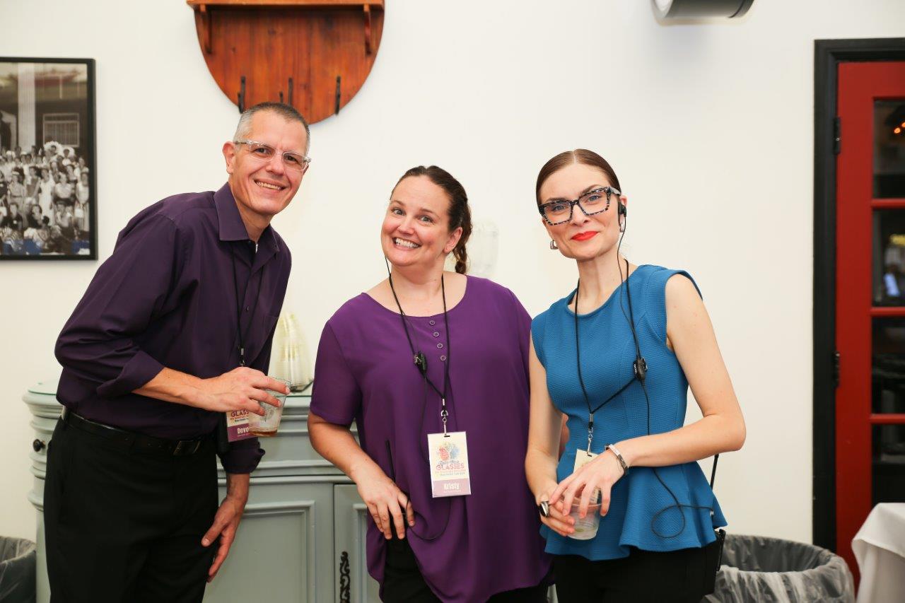 3 staff smiling during Raise Your Glasses 2018 Event