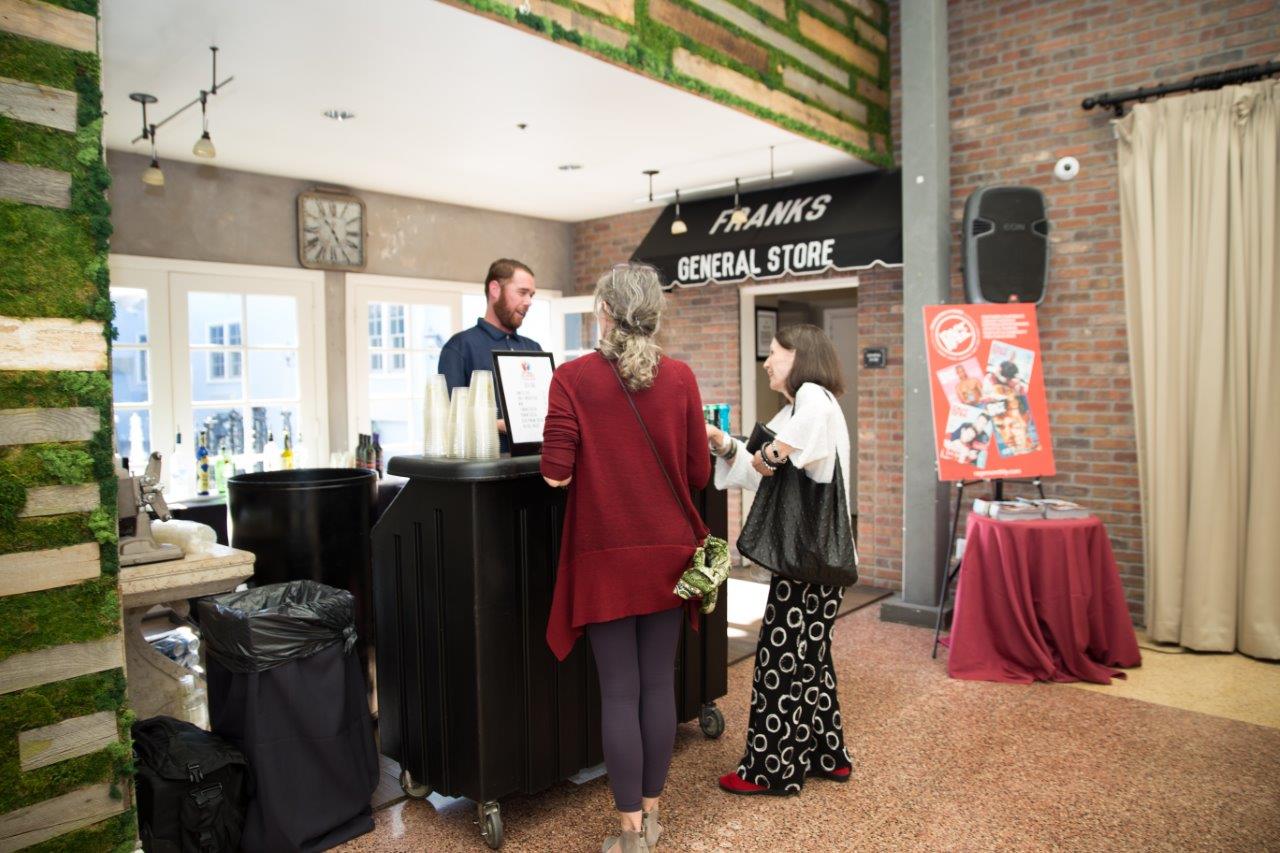 2 people talking with bartender at Raise Your Glasses 2018 Event