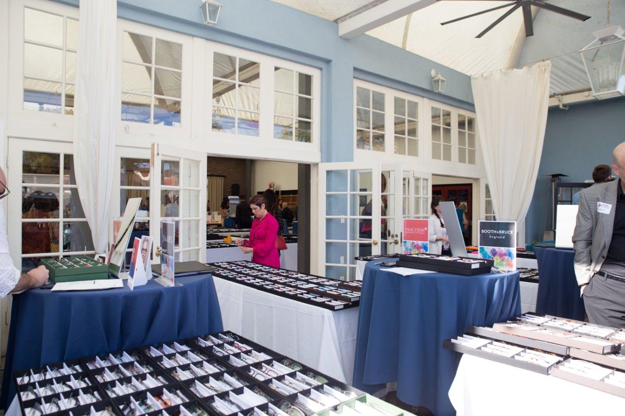View of many tabletop frameline displays at Raise Your Glasses 2018 Event