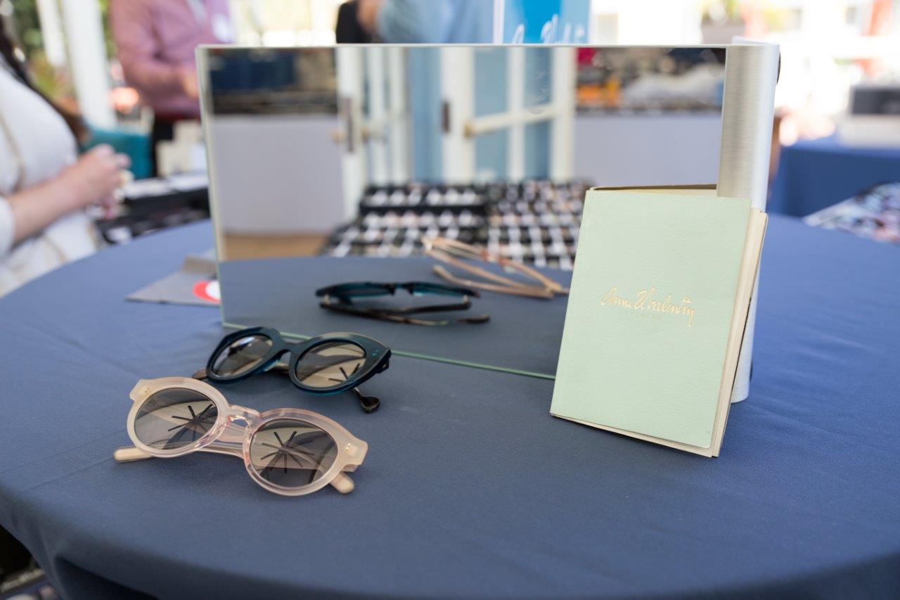 Frames on blue tablecloth at Raise Your Glasses 2018 Event