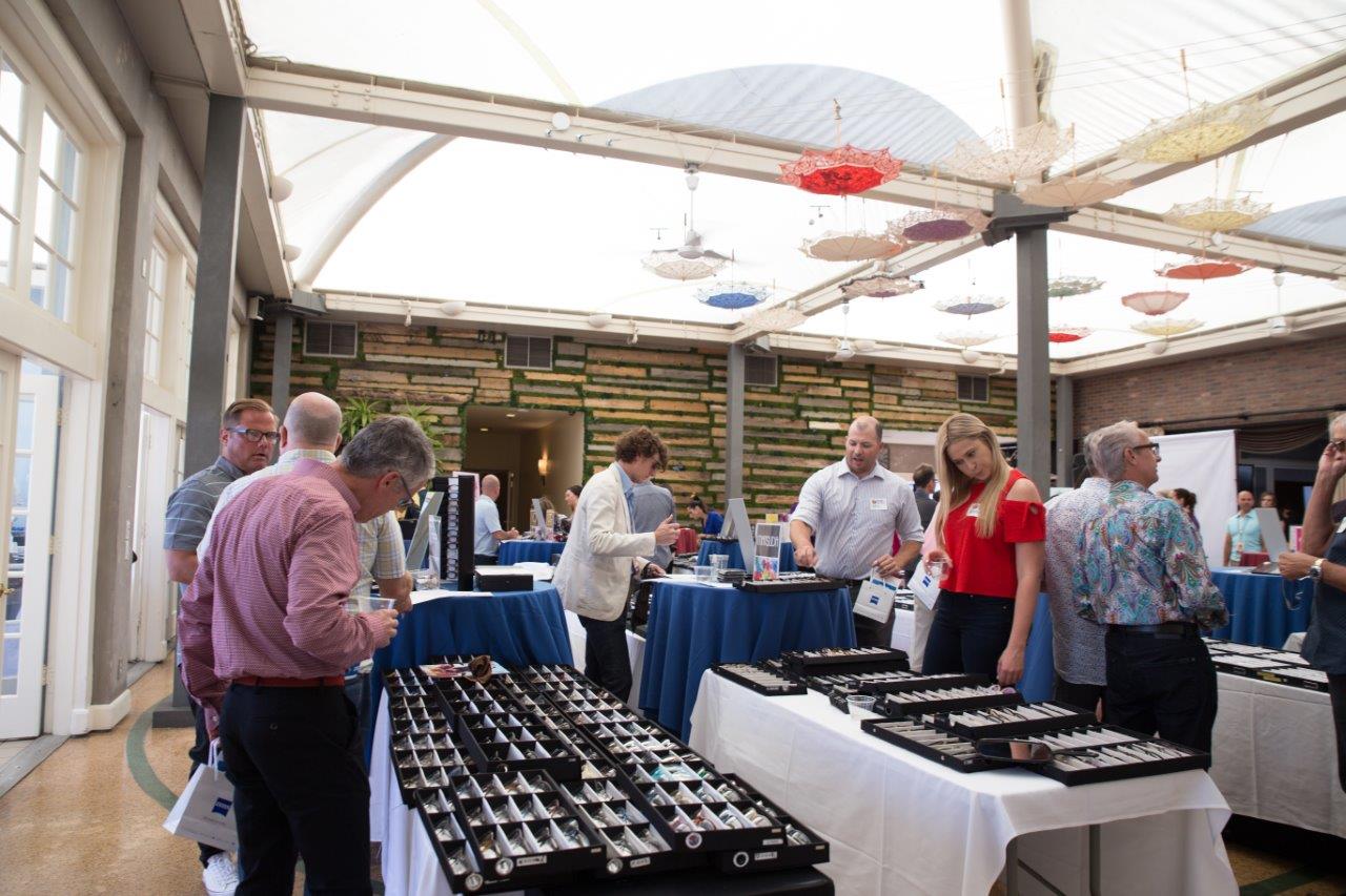 Many people viewing frame lines at Raise Your Glasses 2018 Event