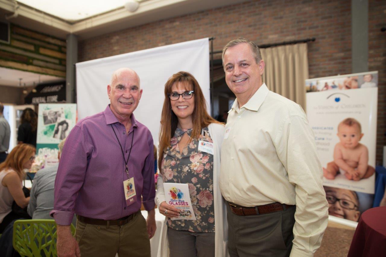 Dr Klein and guests at Raise Your Glasses 2018 Event
