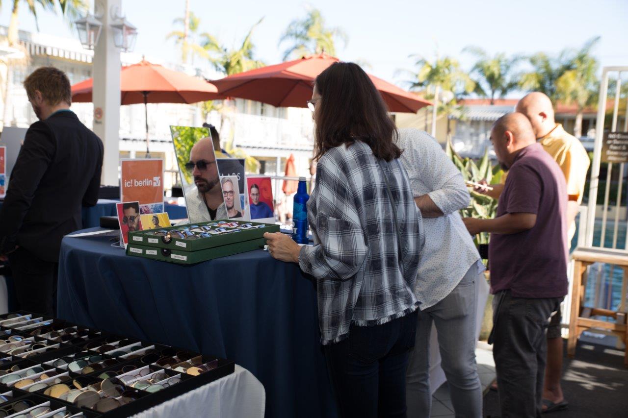 Person admiring framelines at outdoor display at Raise Your Glasses 2018 Event