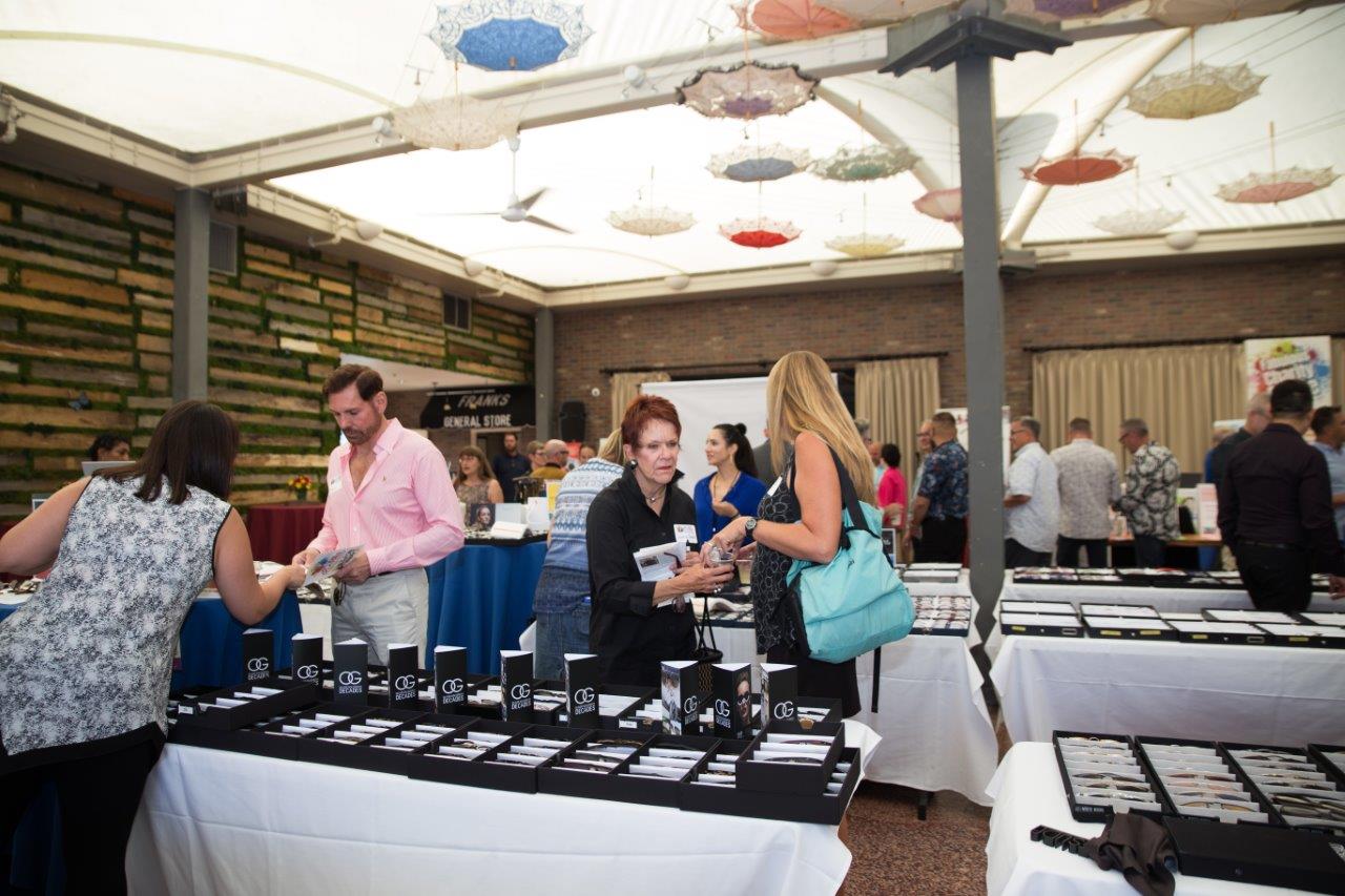 Guests chatting at Raise Your Glasses 2018 Event