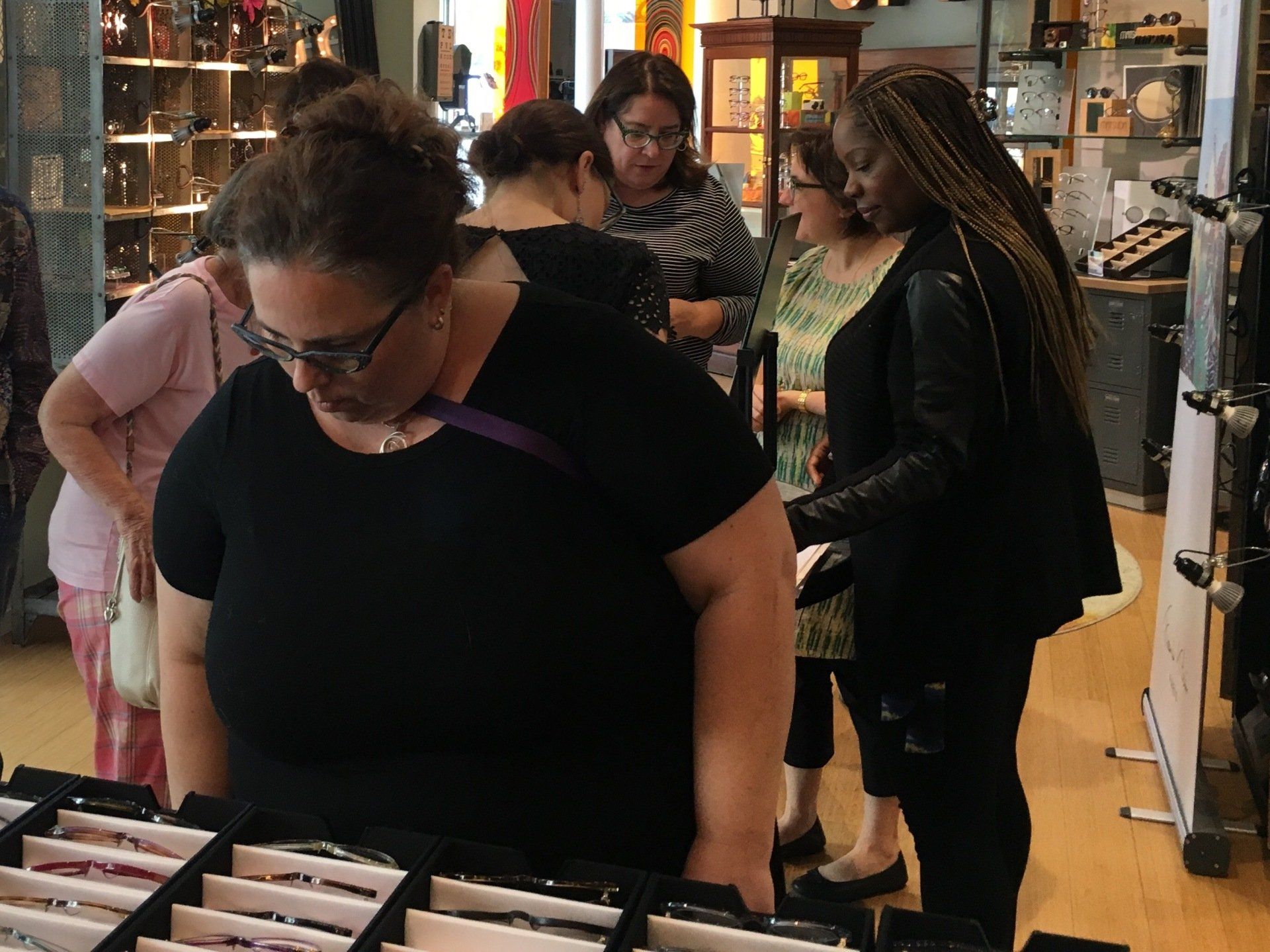 Person looking at frames at 2017 Francis Klein Trunk Show