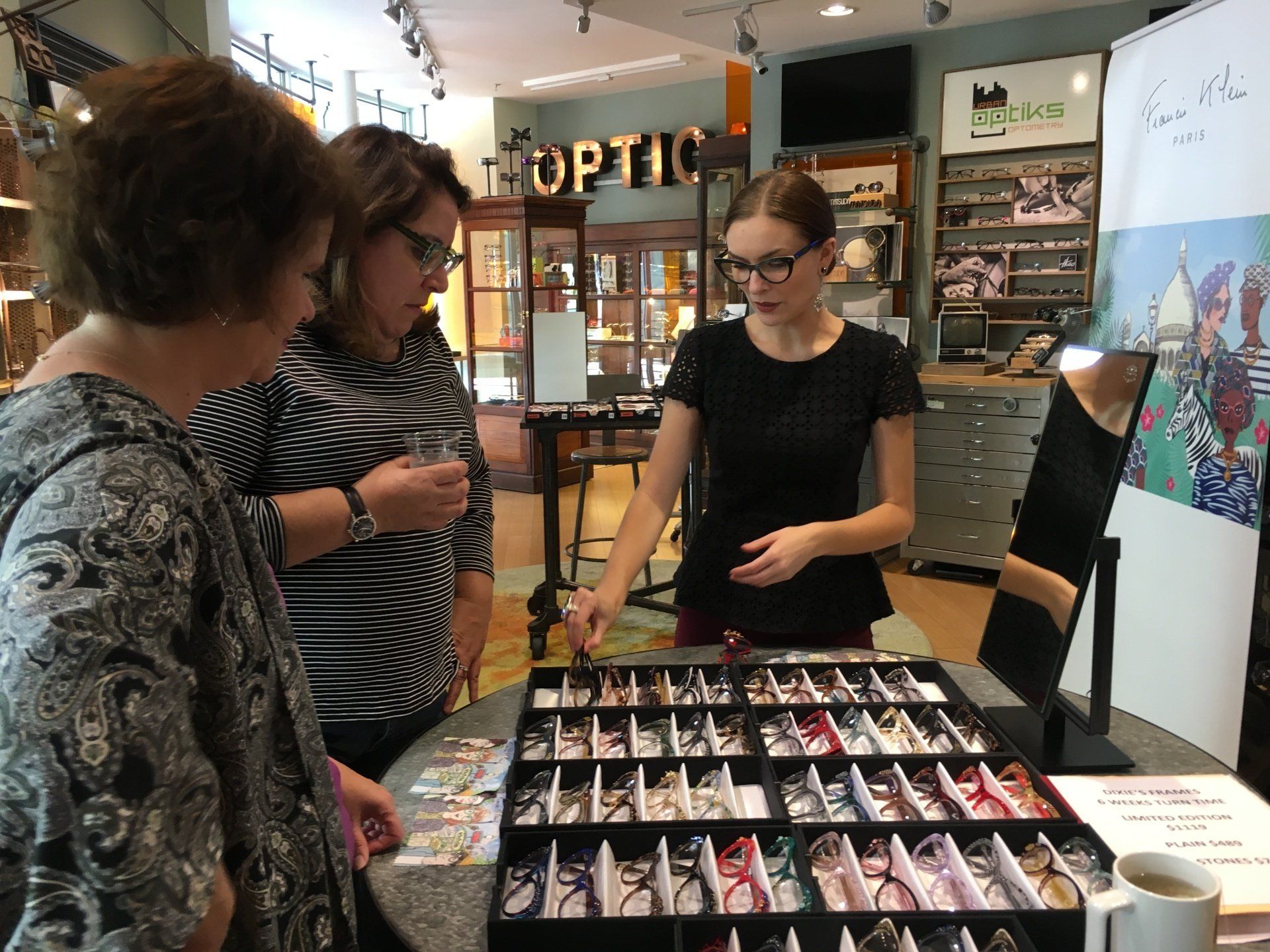 People viewing frameline at Francis Klein Trunk Show
