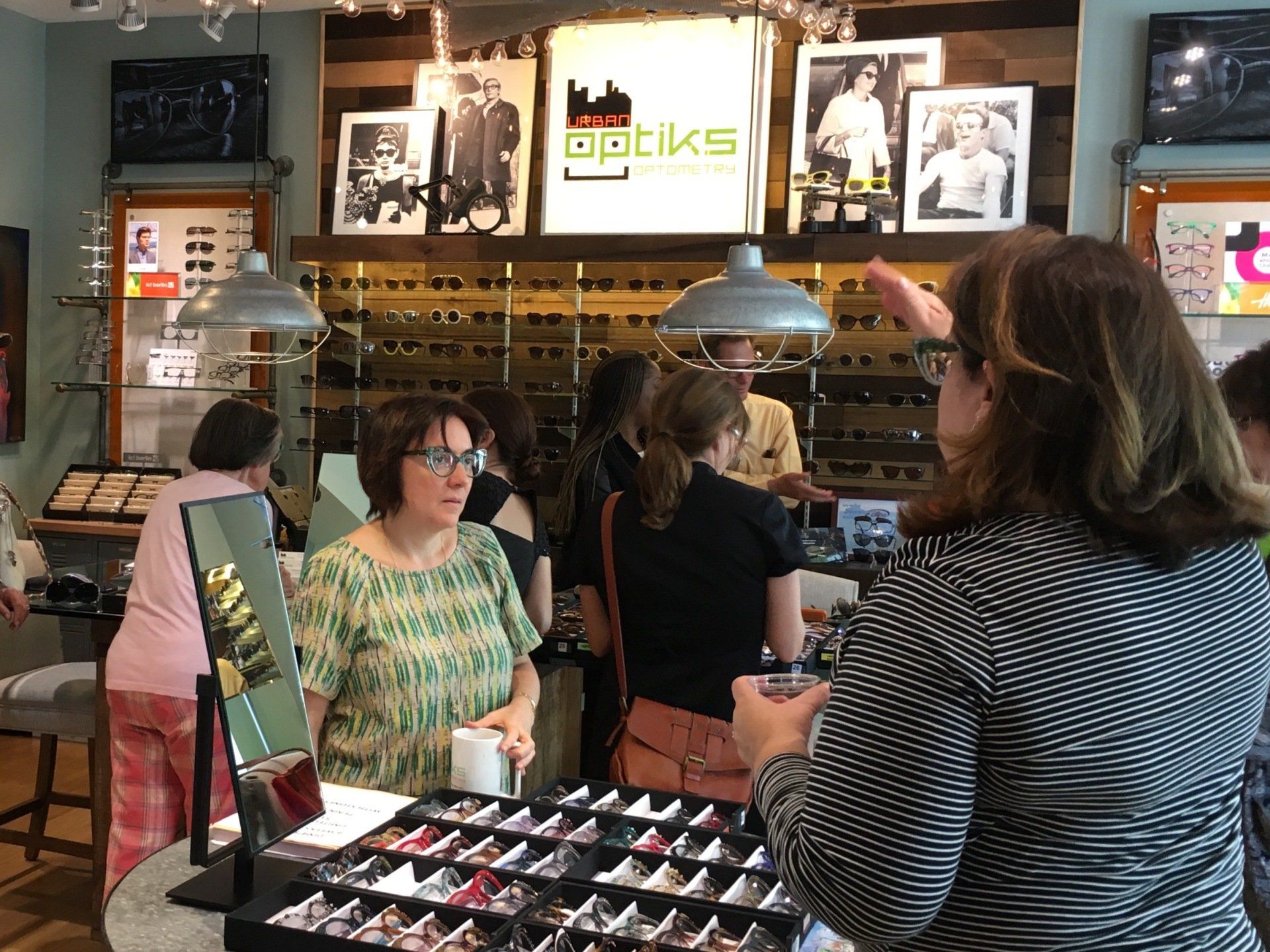 People shopping for frames at 2017 Francis Klein Trunk Show