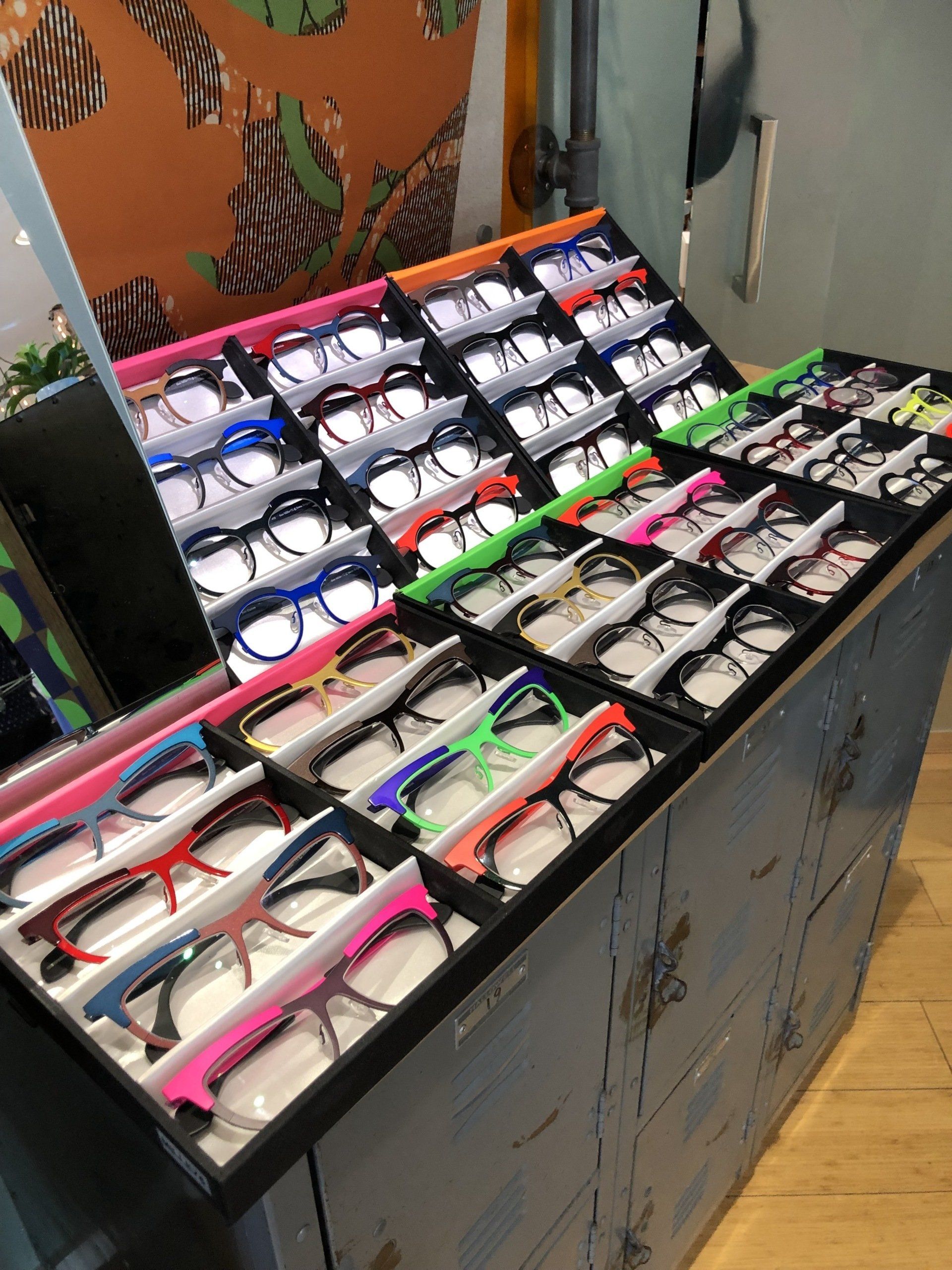 Display cases of Theo frames at Theo Trunk Show Event