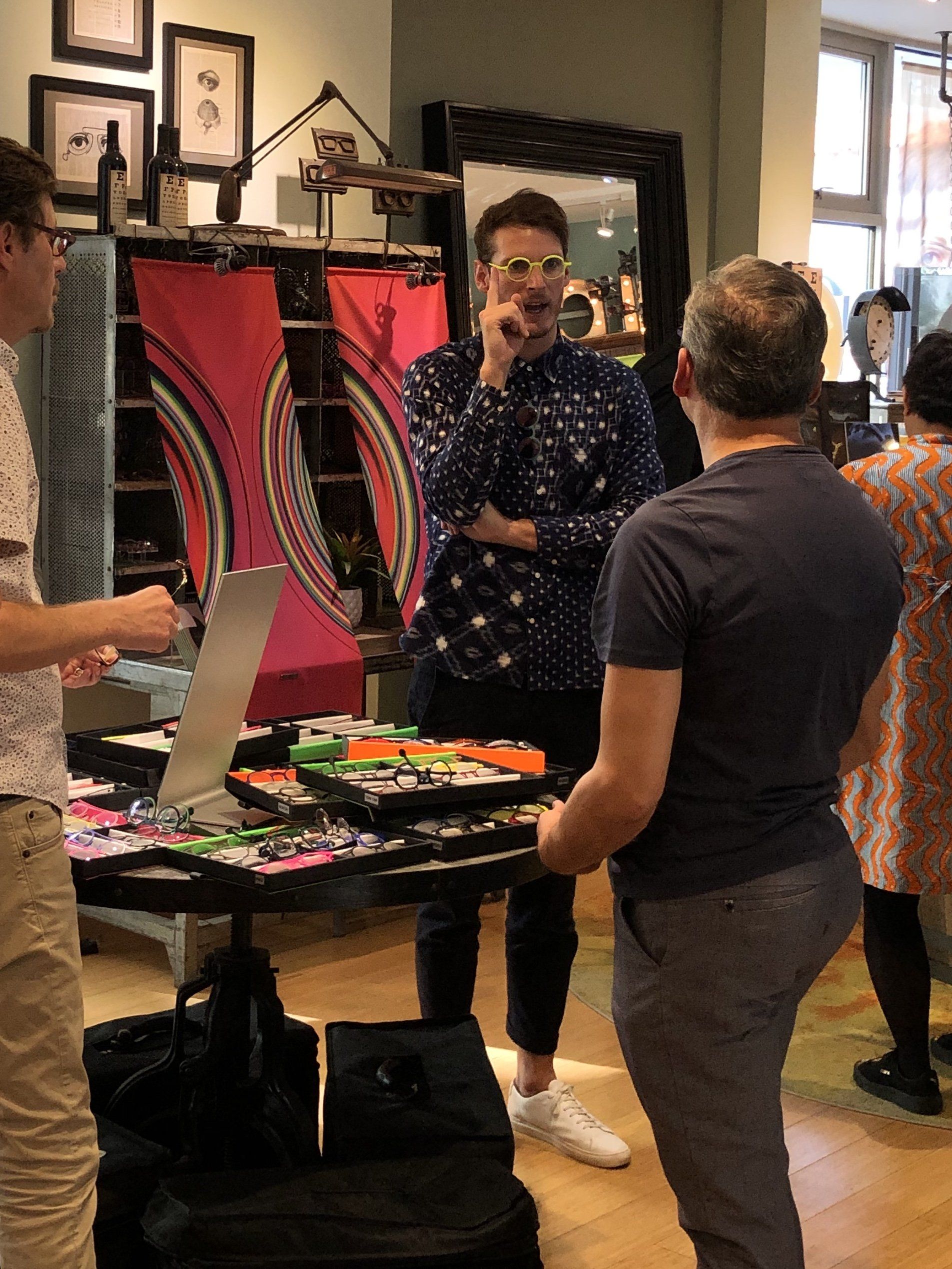 Two people chatting at Theo Trunk Show Event