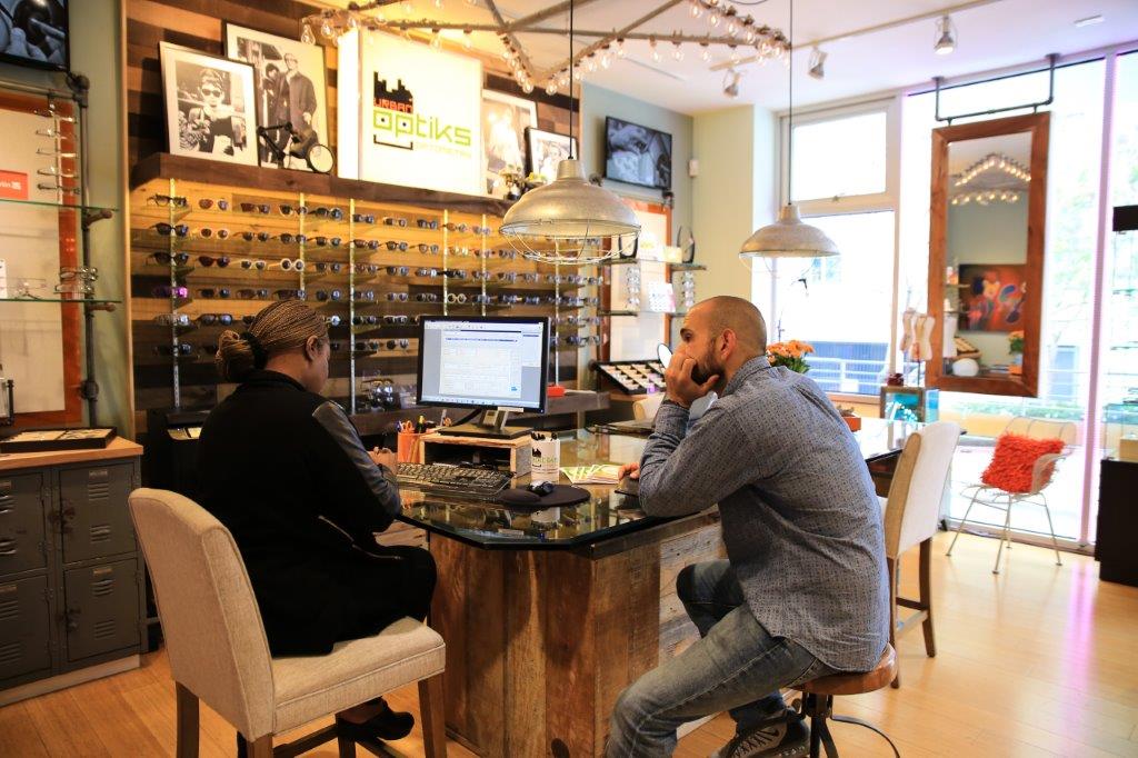 People sitting inside Urban Optiks Optometry at Raise Your Glasses 2017 Event