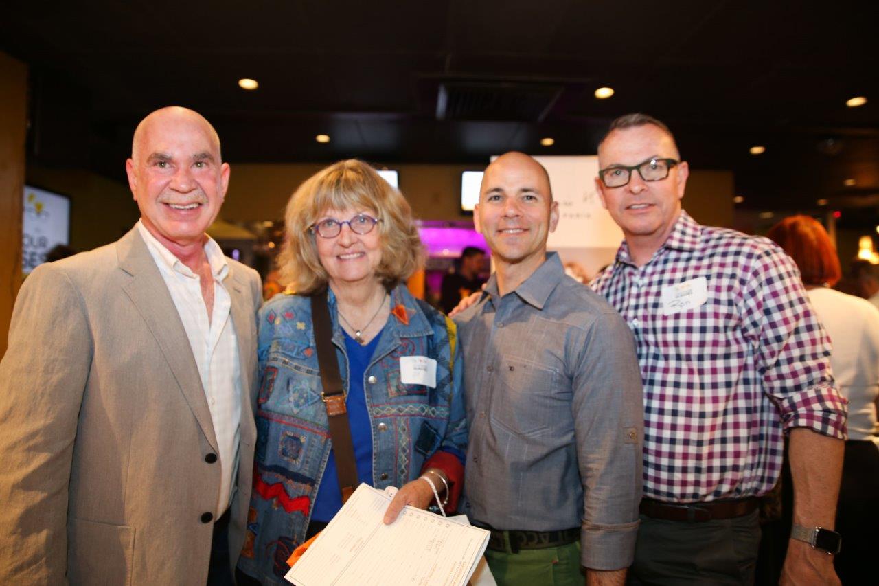 Dr Klein and 3 guests at Martinis Above Fourth at Raise Your Glasses event