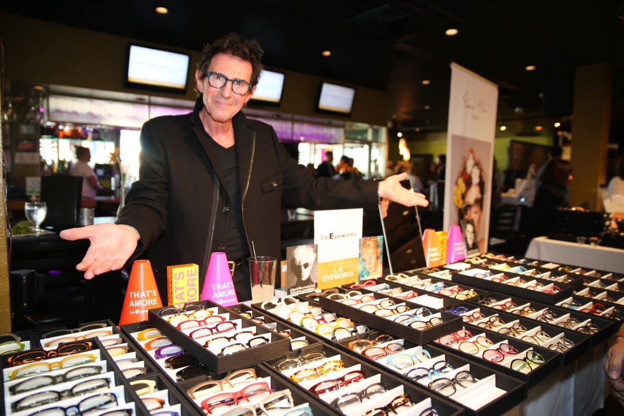Vendor showing off frameline at Raise Your Glasses event