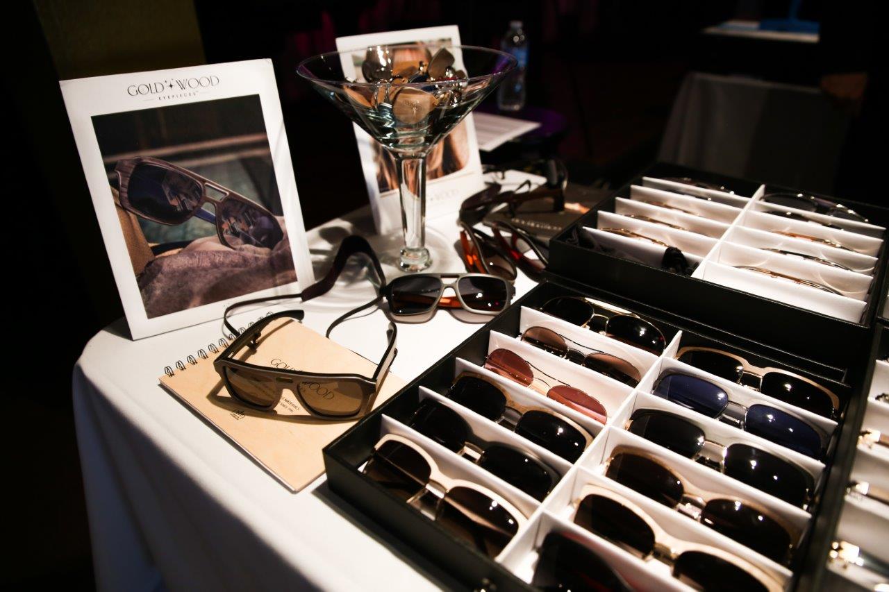 Vendor table filled with sunglasses  at Raise Your Glasses event