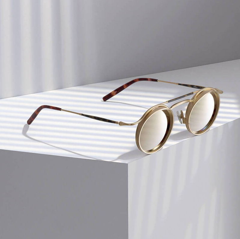 Matsuda sunglasses in gold metal with gold mirror tint lenses