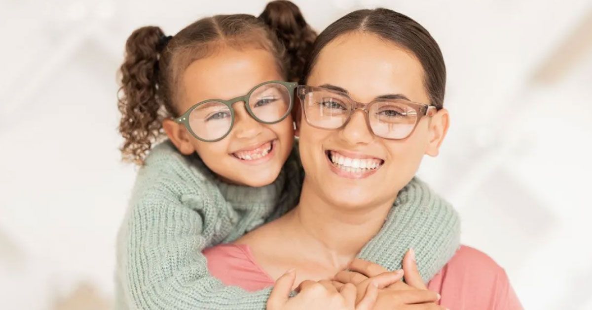 A woman and child wearing glasses