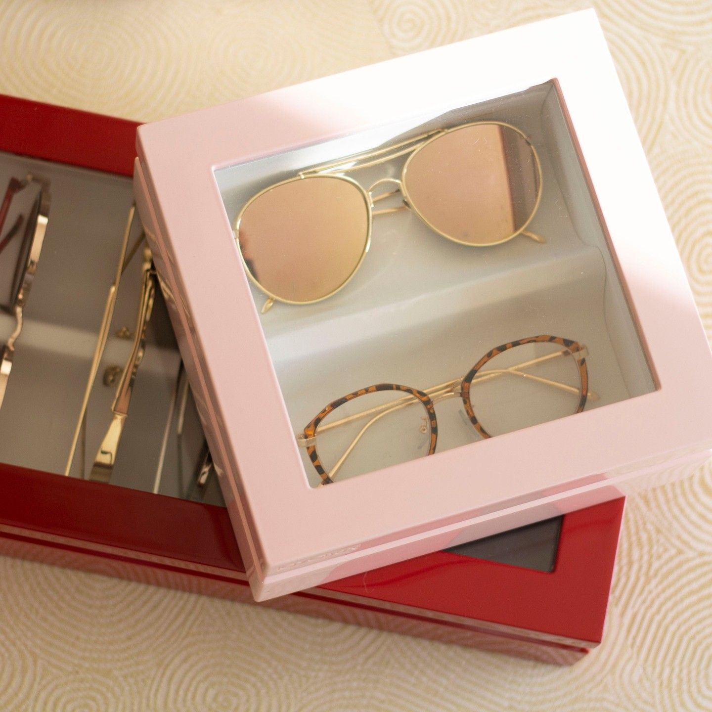 Pink square and orange rectangle OYO Box Eyewear Storage Organizers with glasses inside