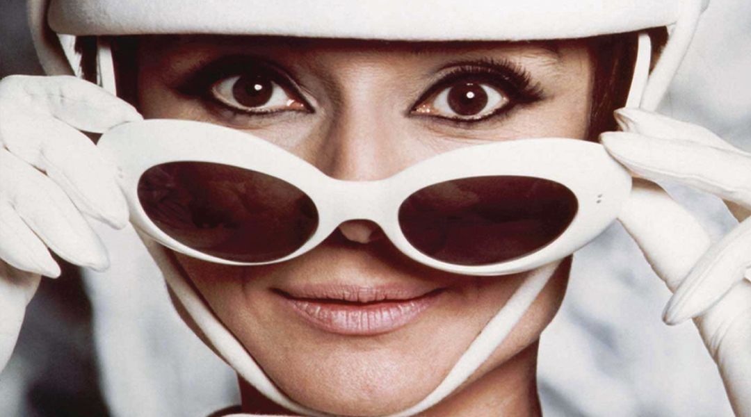 Woman wearing a vintage pair of Oliver Goldsmith sunglasses
