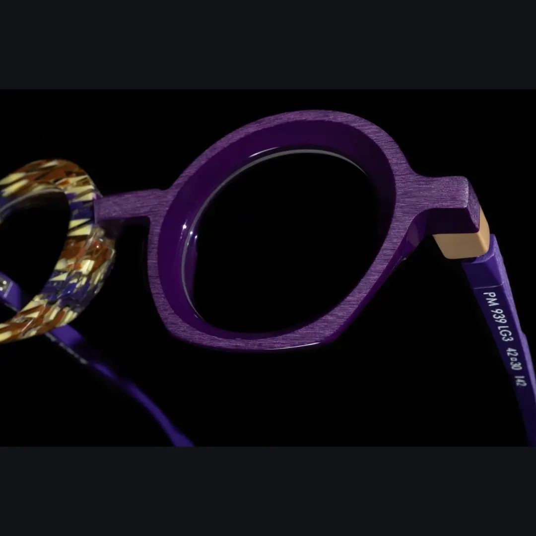 A pair of Pieroo Massara glasses in brown, yellow and purple