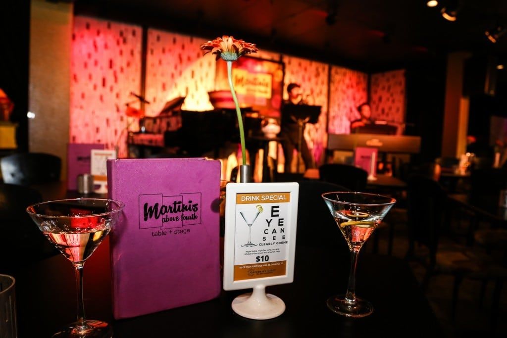 Pink Martinis Above Fourth menu on table at 2015 Raise Your Glasses event