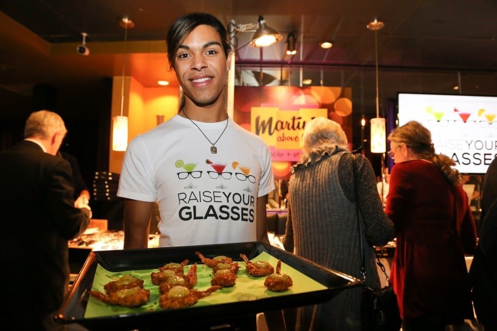 Server holding tray of appetizers at 2015 Raise Your Glasses event at Martinis Above Fourth