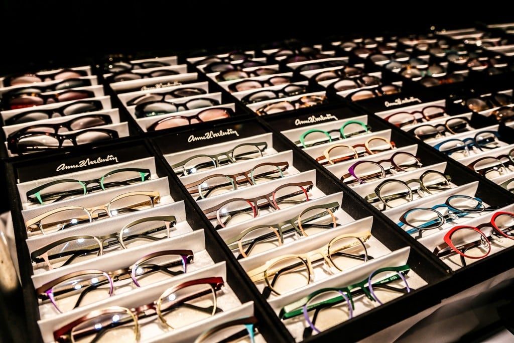 Various display boxes with eyeglass frames at 2015 Raise Your Glasses event